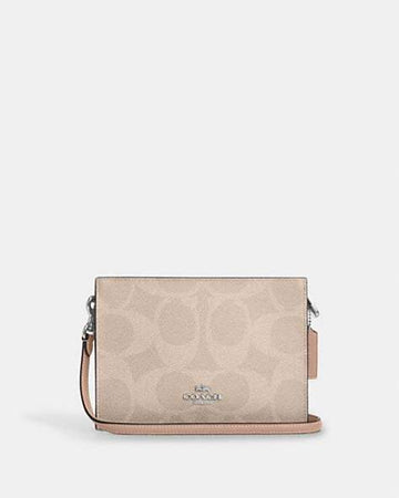 Slim Crossbody Bag In Signature Canvas