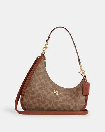 Twisted Teri Shoulder Bag In Signature Canvas