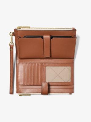 Jet Set Travel smartphone wallet with our exclusive logo