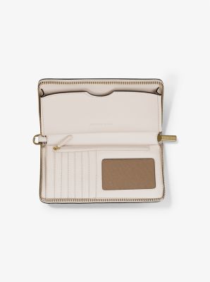 Large wristlet phone bag in grained leather