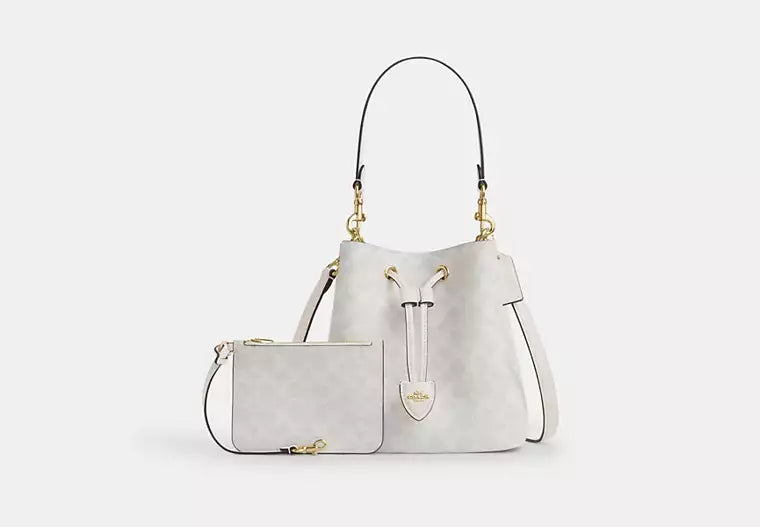 Rowan Bucket Bag In Signature Canvas