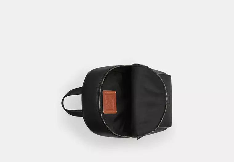 Turnlock Sling Pack In Signature Canvas