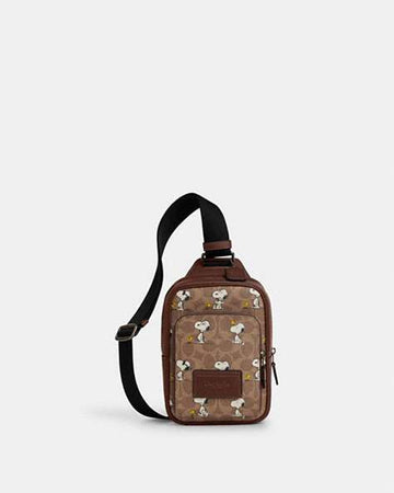 Coach X Peanuts Racer Sling Pack In Signature Canvas With Snoopy Print