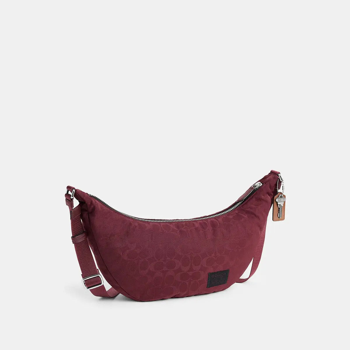 Coach Leon Sling Bag Signature Nylon Jacquard Light Maroon